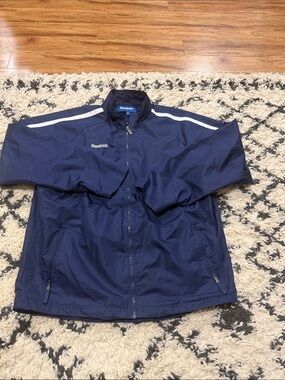 Reebok Men's Navy Windbreaker Jacket with White Shoulder Stripe